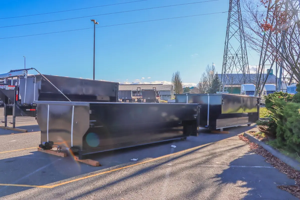 Roll-off dumpster ready for waste disposal at job site for 15 Yard Dumpster Rental in Mack